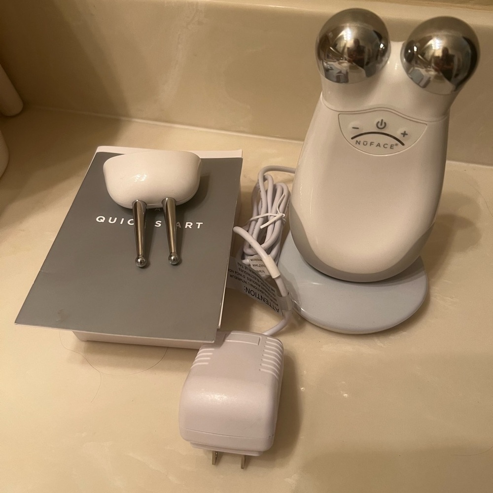 Nuface Trinity, preowned. No gel included, no box. Nothing wrong with it.
